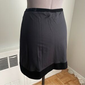 Black Stretch mini skirt with velvet trim. size small